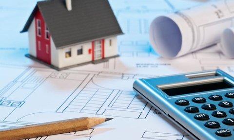 Hausmodell auf Grundrissplänen Hausmodell auf Grundrissplänen